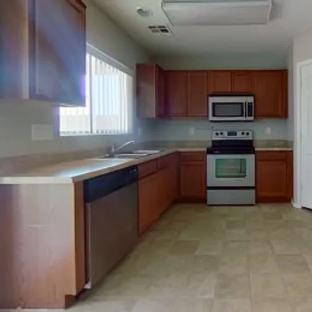 Rent this 3 bed apartment on 21532 West Durango Street in Sundance, Buckeye