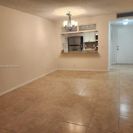 Rent this 2 bed apartment on 9724 Twin Lakes Drive in Coral Springs, FL 33071