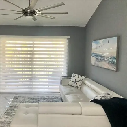 Rent this 2 bed condo on Wildwood Lakes Boulevard in Collier County, FL 34104