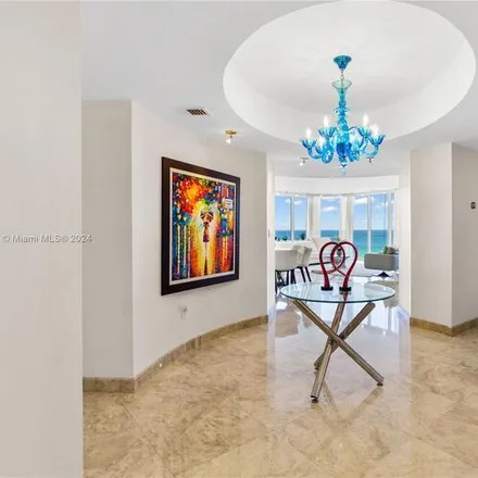 Rent this 3 bed condo on 19111 Collins Ave