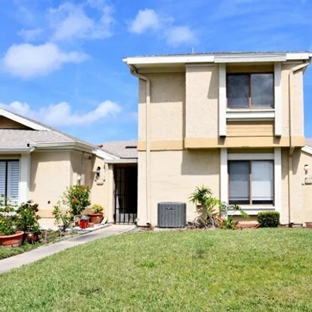 Buy this 3 bed townhouse on 1033 Abada Court Northeast in Palm Bay, FL 32905