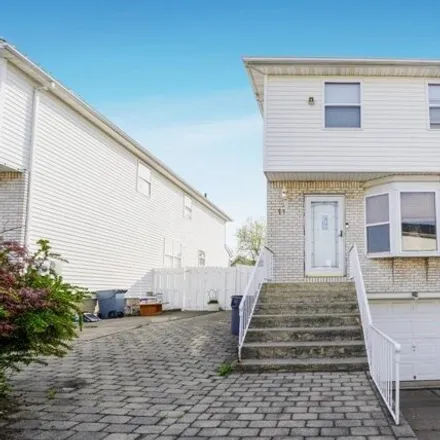 Buy this 3 bed house on 11 North Edo Court in New York, NY 10309