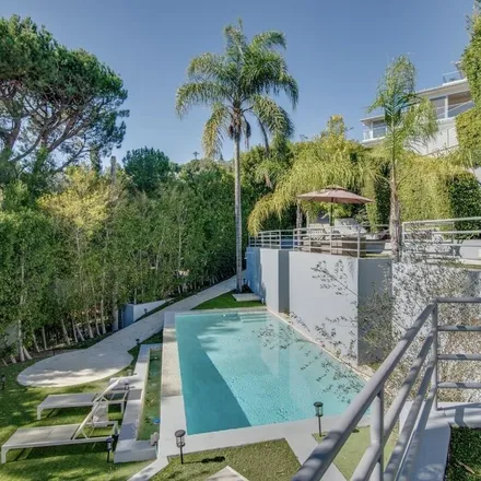 Rent this 5 bed house on 8954 Saint Ives Drive in Los Angeles, CA 90069