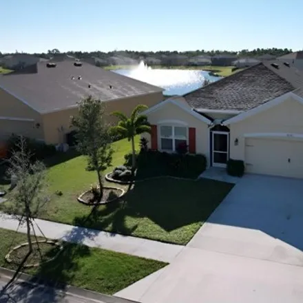 Rent this 4 bed house on 8695 Cobblestone Drive in Saint Lucie County, FL 34945