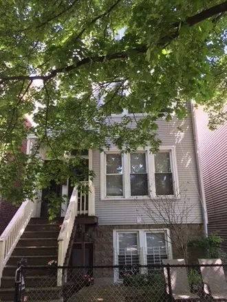 Rent this 2 bed house on 1248 West Wellington Avenue in Chicago, IL 60618