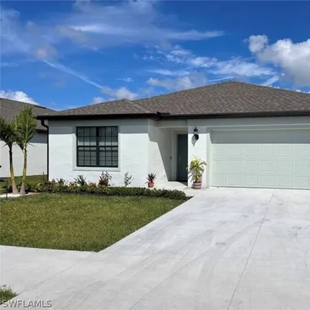 Rent this 3 bed house on Firebush Circle in Bayshore Commons, Lee County