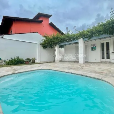 Rent this 3 bed house on Servidão Nelson Conrado da Silva in Campeche, Florianópolis - SC