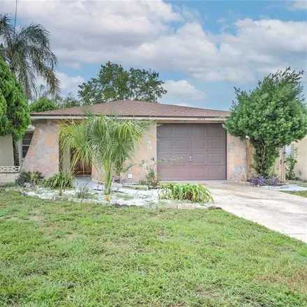 Image 2 - 6630 Lenoir Drive, Jasmine Estates, FL 34668, USA - House for sale