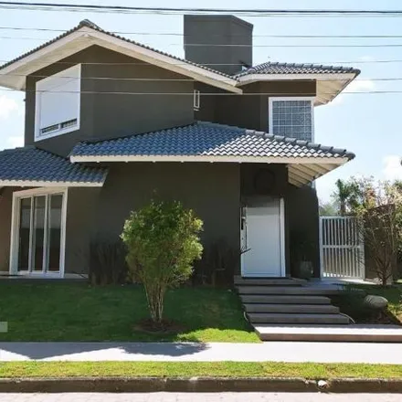 Buy this 4 bed house on Rua das Tibiras in Jurerê Internacional, Florianópolis - SC