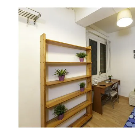 Rent this 6 bed room on Carrer dels Doctors Trias i Pujol in 08001 Barcelona, Spain