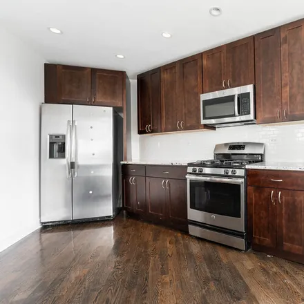 Rent this 4 bed apartment on 2450 N Milwaukee Ave
