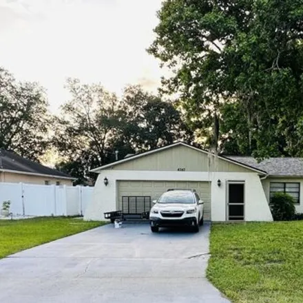 Buy this 3 bed house on 4353 Merchant Avenue in Spring Hill, FL 34608