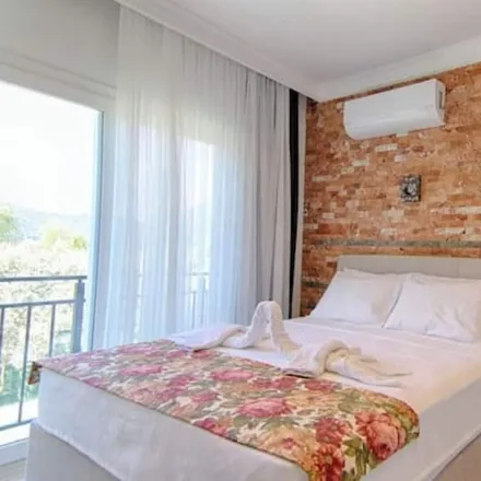 Rent this 4 bed house on c15-gocek-inlice-gunluklu-koyu-195-km in 48310 Fethiye, Turkey