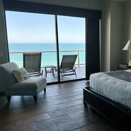 Rent this 4 bed condo on Rocky Point