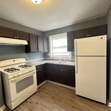 Rent this 2 bed apartment on 2103 East 98th Place in Chicago, IL 60617