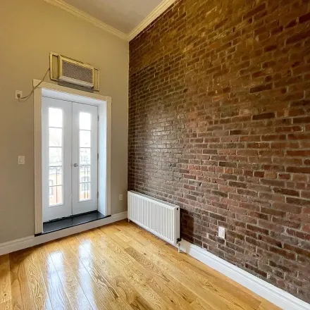 Rent this 4 bed apartment on 400 West 50th Street in New York, NY 10019