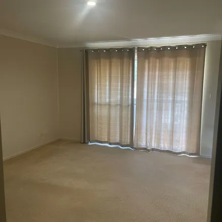 Rent this 3 bed apartment on unnamed road in Tallwoods Village NSW 2430, Australia