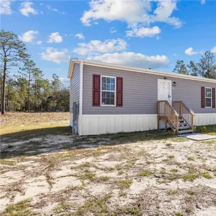 Buy this studio apartment on 374 Southeast 142nd Terrace in Levy County, FL 32696