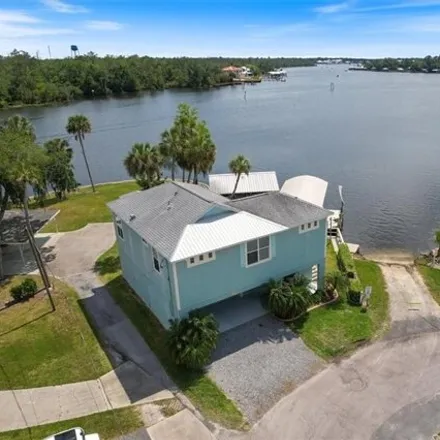 Buy this 3 bed house on 4459 South Capecove Loop in Citrus County, FL 34448