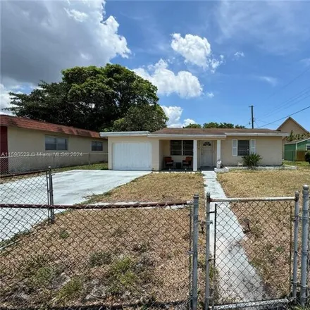 Buy this 2 bed house on 2461 NW 18th Ct in Fort Lauderdale, Florida