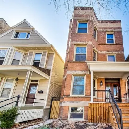 Buy this 6 bed house on 3746 North Hermitage Avenue in Chicago, IL 60613