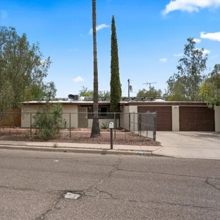 Buy this 4 bed house on 1830 South Irving Avenue in Tucson, AZ 85711