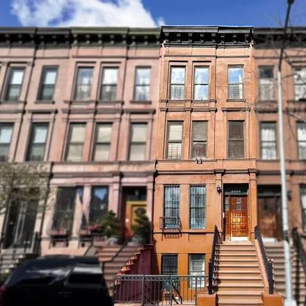 Buy this 4 bed townhouse on 2044 Madison Avenue in New York, NY 10035