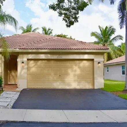 Buy this 3 bed house on 2044 Andromeda Lane in Weston, FL 33327
