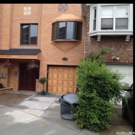 Buy this 4 bed townhouse on 33-02 143rd Street in New York, NY 11354