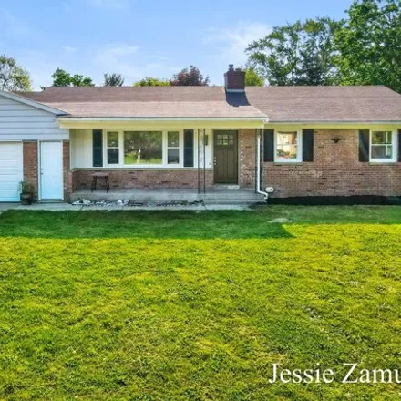 Buy this 4 bed house on 5030 Primrose Avenue Southeast in Kentwood, MI 49548