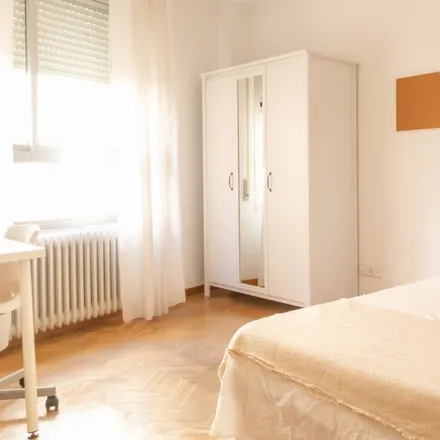 Rent this 7 bed room on Madrid in Viajes Tembo, Calle de Feijoo