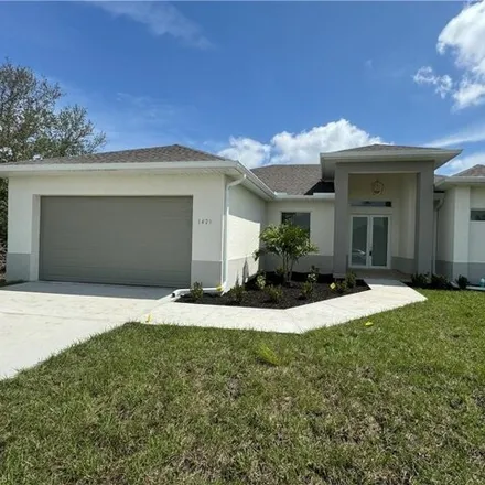 Rent this 3 bed house on 1473 Northeast 17th Avenue in Cape Coral, FL 33909