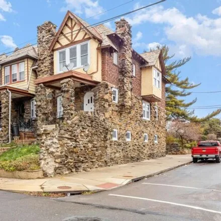 Buy this 4 bed house on 605 East Woodlawn Street in Philadelphia, PA 19144