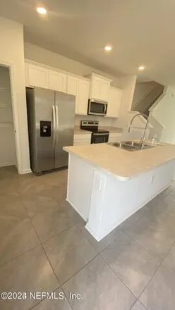 Rent this 2 bed townhouse on unnamed road in Jacksonville, FL 32255