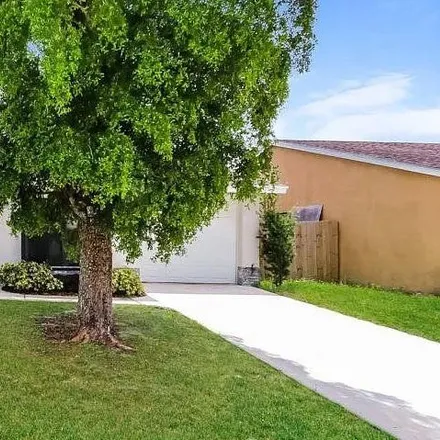 Buy this 2 bed house on 5905 Triphammer Road in Palm Beach County, FL 33463