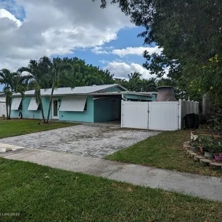 Image 1 - 753 Cinnamon Road, North Palm Beach, FL 33408, USA - House for rent