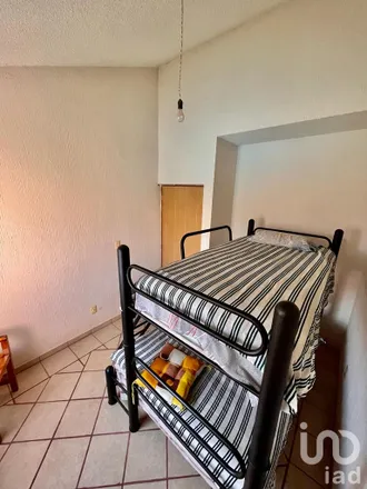 Buy this 3 bed house on Calle Sauce Americano in Villas de Tezoyuca, 62766 Tezoyuca
