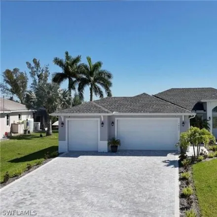 Buy this 4 bed house on 1979 Northwest 36th Place in Cape Coral, FL 33993
