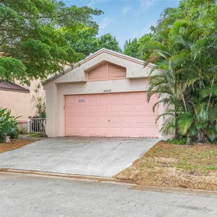 Buy this 3 bed house on 2231 Northwest 34th Terrace in Coconut Creek, FL 33066