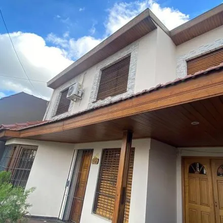 Buy this 3 bed house on Santiago de Chile 1000 in Partido de Morón, B1708 FEU Morón