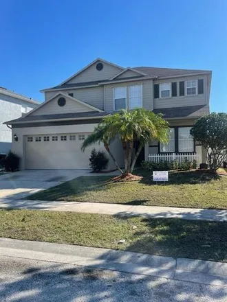 Rent this 4 bed house on 11882 Old Glory Drive in Orange County, FL 32837