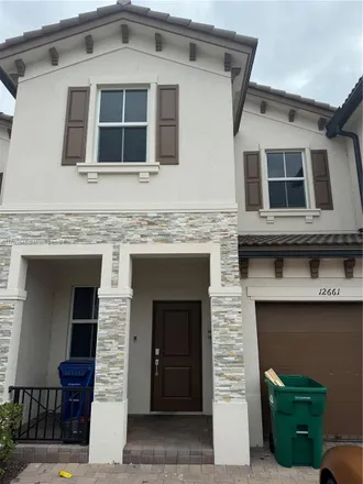 Rent this 4 bed townhouse on 12661 Northwest 23rd Place