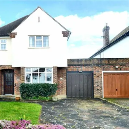Buy this 4 bed house on Grange Meadow in Banstead, SM7 3RD