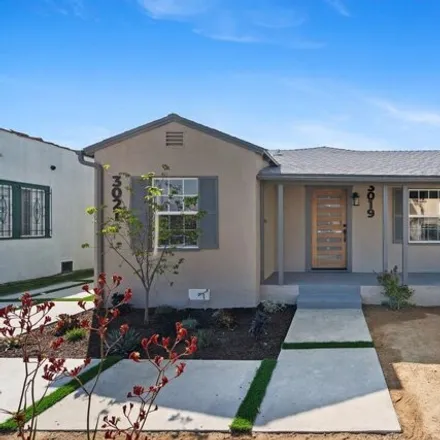 Buy this 5 bed house on 3039 South Palm Grove Avenue in Los Angeles, CA 90016