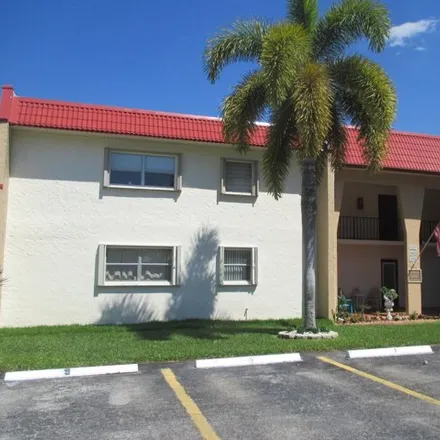 Rent this 2 bed condo on 346 Lake Frances Drive in Golden Lakes, Palm Beach County