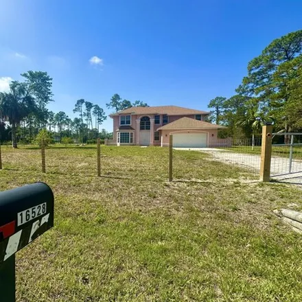 Rent this 5 bed house on 16514 89th Place North in Palm Beach County, FL 33470