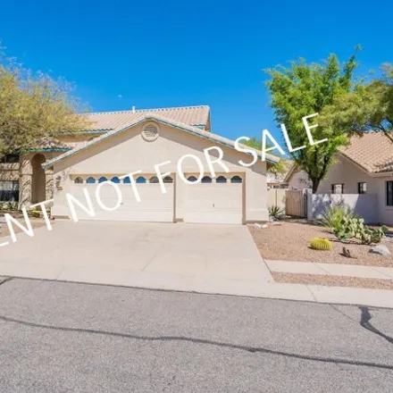 Rent this 4 bed house on 12480 North Copper Queen Way in Oro Valley, AZ 85755