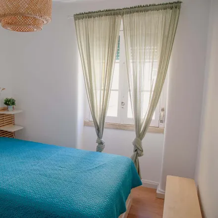 Rent this 6 bed room on Avenida São João de Deus in 1000-009 Lisbon, Portugal