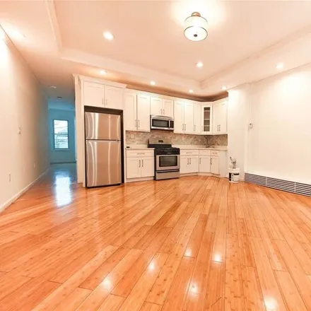 Rent this 3 bed house on 90-33 80th Street in New York, NY 11421