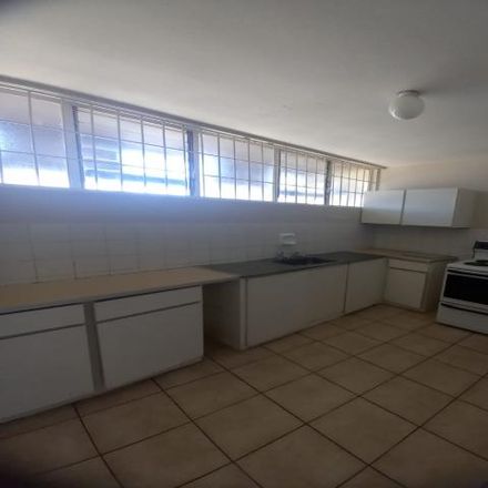 Rent this 3 bed house on Jan Rabie Street in Langenhovenpark, Bloemfontein
